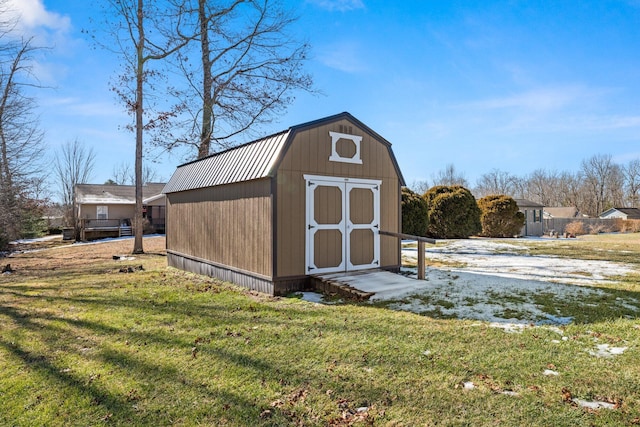 view of outdoor structure with a yard