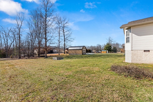 view of yard with a storage shed