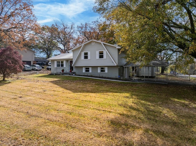 view of front of property featuring a front lawn and a carport