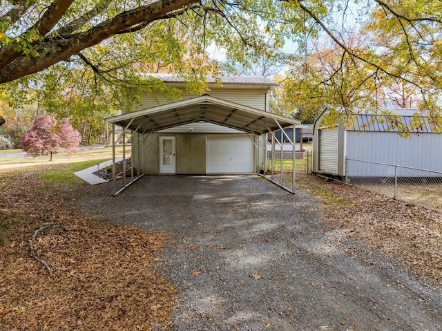 exterior space featuring a carport and a garage