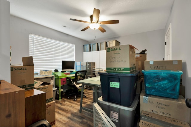 office space with hardwood / wood-style flooring and ceiling fan