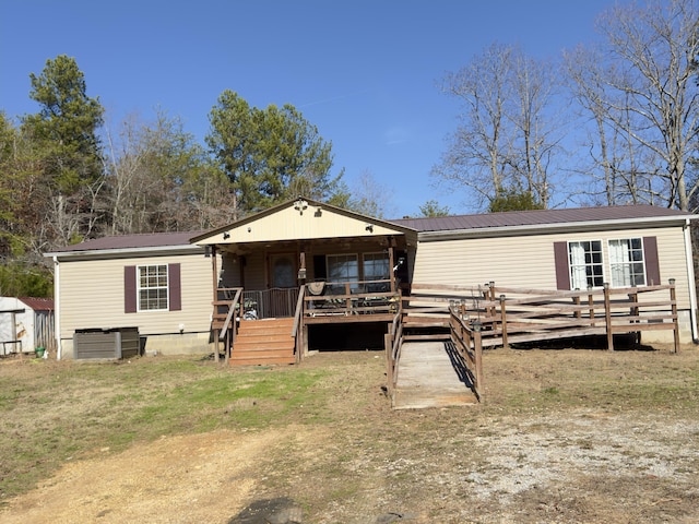 view of front of property with a deck