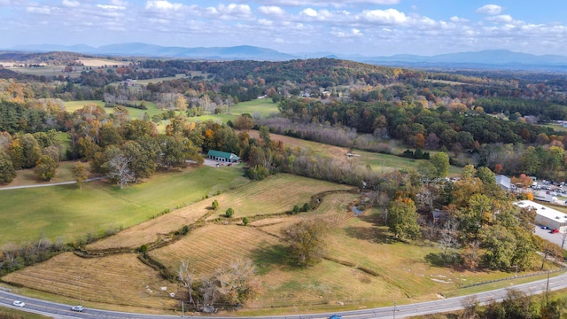 bird's eye view featuring a mountain view and a rural view