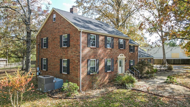 colonial inspired home featuring central AC