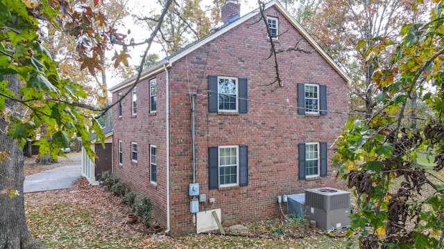 view of property exterior featuring cooling unit