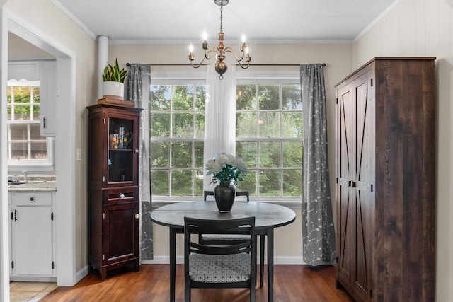 352 W Rhea Ave, Spring City, TN 37381 - dining room with a chandelier, wood finished floors, healthy amount of natural light, and crown molding