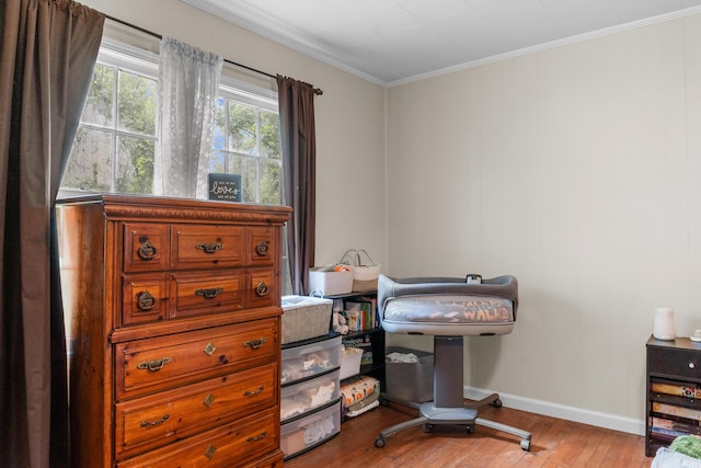 352 W Rhea Ave, Spring City, TN 37381 - bedroom with wood-type flooring and crown molding