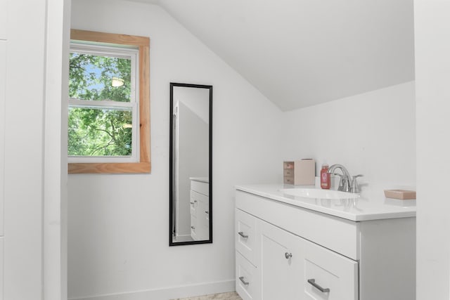352 W Rhea Ave, Spring City, TN 37381 - bathroom with lofted ceiling and vanity