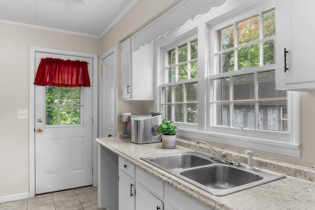 352 W Rhea Ave, Spring City, TN 37381 - kitchen with white cabinets, light countertops, light tile patterned floors, and ornamental molding