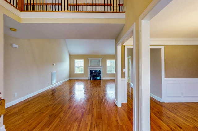 117 Windswept Dr NE, Cleveland, TN 37312 - unfurnished living room with wood finished floors and a fireplace