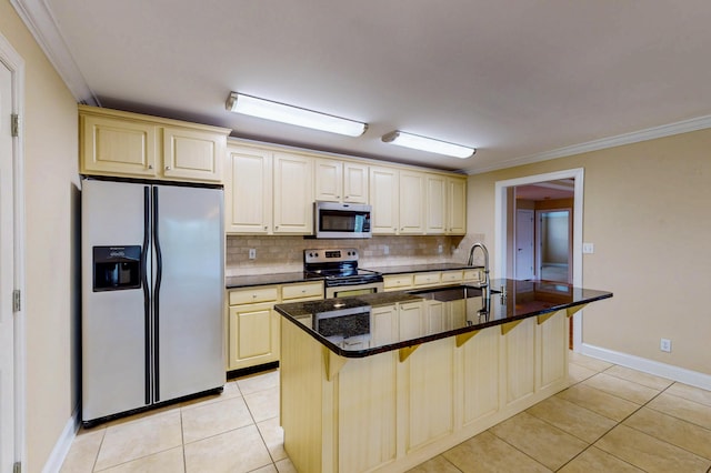 117 Windswept Dr NE, Cleveland, TN 37312 - kitchen featuring appliances with stainless steel finishes, light tile patterned floors, a kitchen bar, decorative backsplash, and ornamental molding
