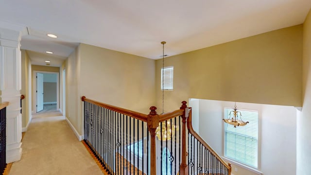 117 Windswept Dr NE, Cleveland, TN 37312 - hall with plenty of natural light, an upstairs landing, light colored carpet, and recessed lighting