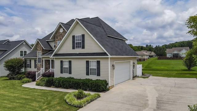 117 Windswept Dr NE, Cleveland, TN 37312 - traditional-style home featuring driveway, a garage, a front lawn, a shingled roof, and stone siding