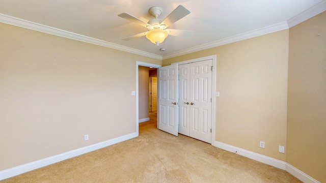 117 Windswept Dr NE, Cleveland, TN 37312 - unfurnished bedroom featuring light colored carpet, crown molding, a closet, and a ceiling fan