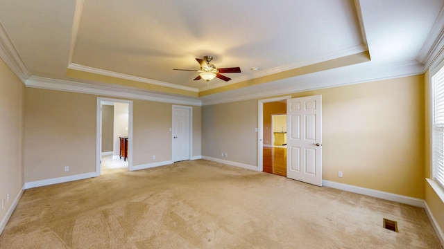 117 Windswept Dr NE, Cleveland, TN 37312 - unfurnished bedroom with a raised ceiling, ornamental molding, light colored carpet, and a ceiling fan