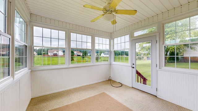 117 Windswept Dr NE, Cleveland, TN 37312 - unfurnished sunroom with carpet floors, a ceiling fan, and wood walls