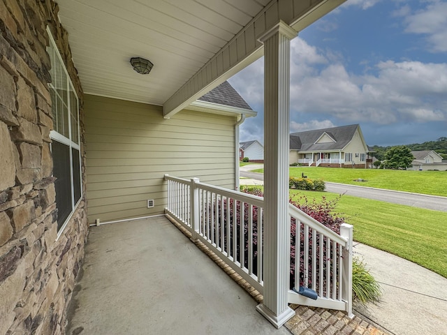117 Windswept Dr NE, Cleveland, TN 37312 - covered porch with a lawn and a residential view