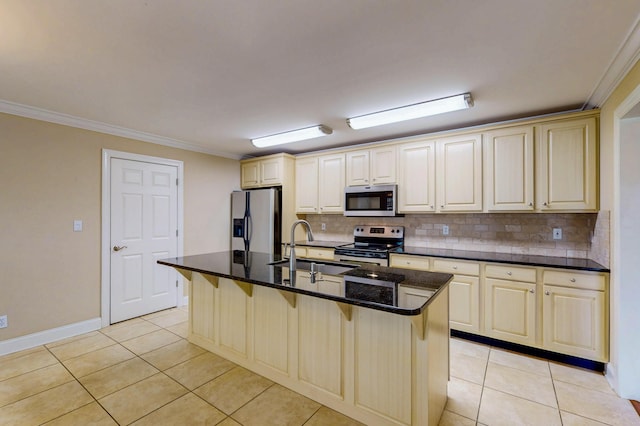 117 Windswept Dr NE, Cleveland, TN 37312 - kitchen featuring appliances with stainless steel finishes, light tile patterned floors, backsplash, a kitchen breakfast bar, and ornamental molding