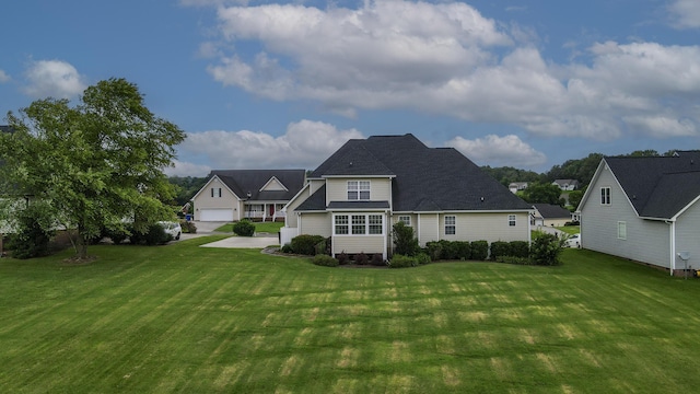 117 Windswept Dr NE, Cleveland, TN 37312 - rear view of house with a yard and a garage