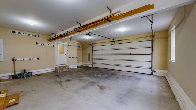 117 Windswept Dr NE, Cleveland, TN 37312 - garage featuring a garage door opener and electric panel