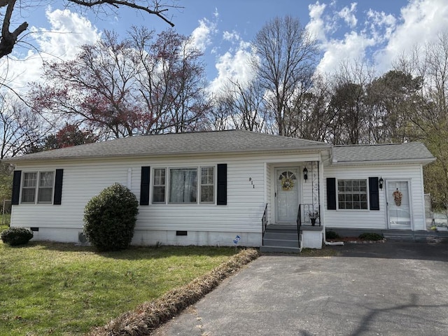 ranch-style home featuring a front yard, roof with shingles, and crawl space