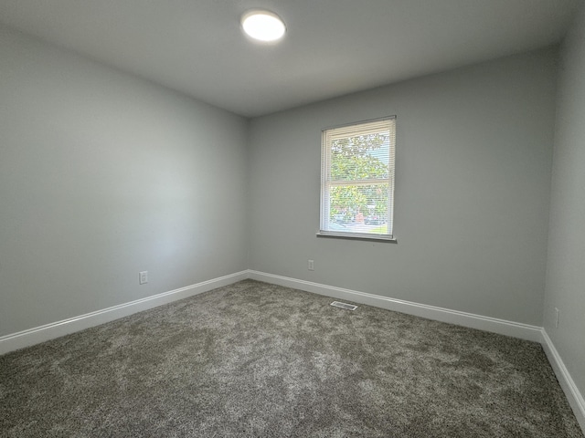 1956 Sun Hill Rd SW, Cleveland, TN 37311 - carpeted empty room with baseboards
