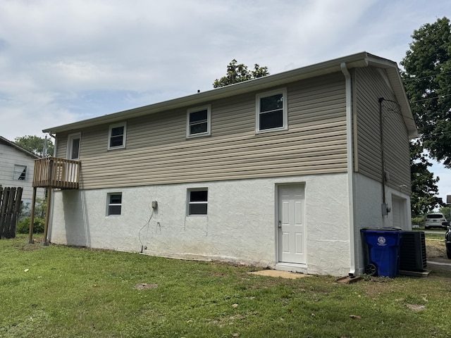 1956 Sun Hill Rd SW, Cleveland, TN 37311 - back of house featuring stucco siding and a lawn