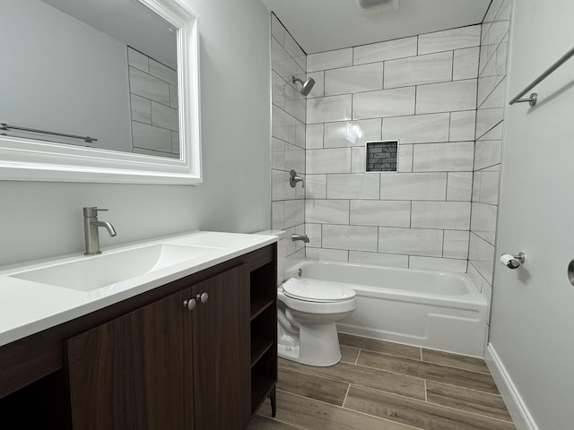 1956 Sun Hill Rd SW, Cleveland, TN 37311 - full bathroom with vanity, wood finished floors, and washtub / shower combination