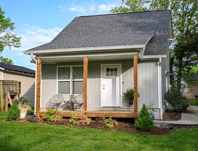 exterior space featuring a porch and a front lawn