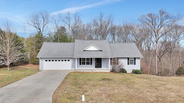 view of front facade with driveway, a front yard, a porch, and an attached garage