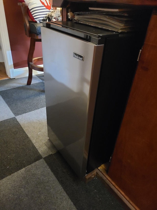 7054 Ski Club Rd, Harrison, TN 37341 - detailed view of refrigerator and tile patterned floors