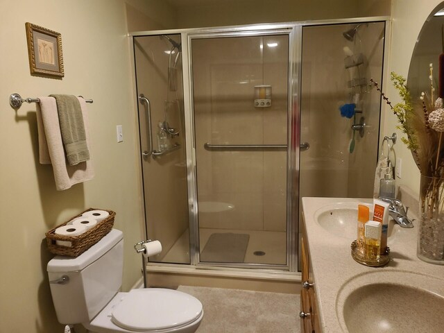 7054 Ski Club Rd, Harrison, TN 37341 - bathroom featuring toilet, a stall shower, and double vanity