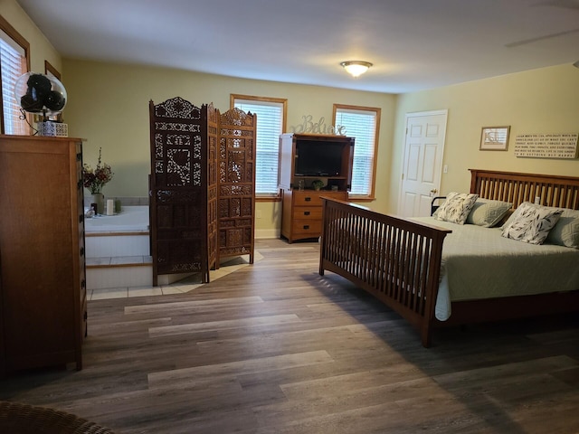 7054 Ski Club Rd, Harrison, TN 37341 - bedroom featuring wood finished floors