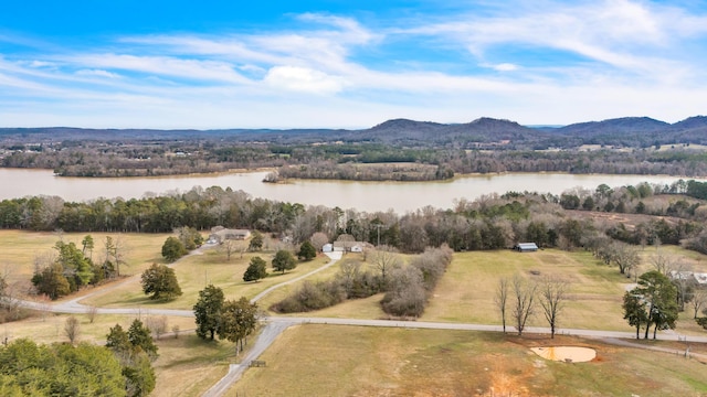 bird's eye view with a water and mountain view