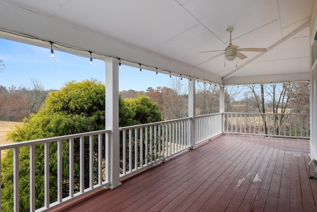 wooden terrace featuring ceiling fan