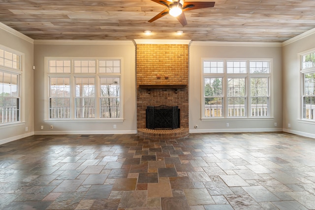 unfurnished living room featuring wooden ceiling, ornamental molding, and a brick fireplace