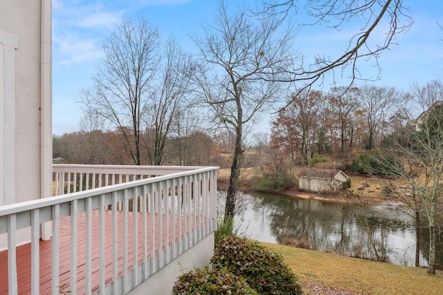 wooden terrace with a water view