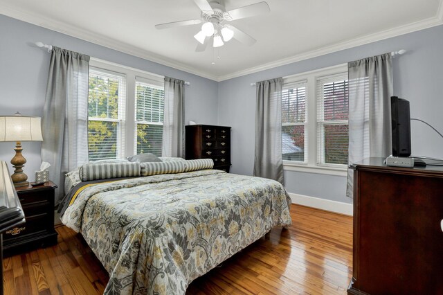 431 Highland Ave NW, Cleveland, TN 37311 - bedroom featuring hardwood / wood-style flooring, crown molding, and a ceiling fan