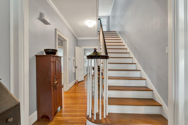 431 Highland Ave NW, Cleveland, TN 37311 - stairs with wood finished floors and crown molding