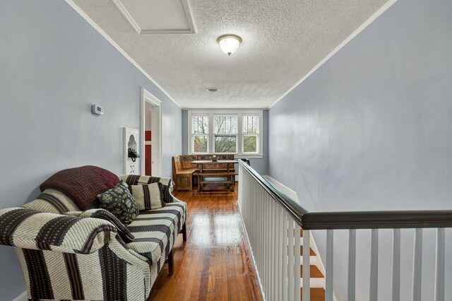 431 Highland Ave NW, Cleveland, TN 37311 - hall featuring crown molding, wood-type flooring, and a textured ceiling