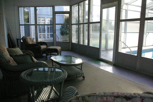 sunroom featuring a healthy amount of sunlight