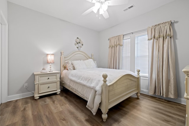 bedroom featuring hardwood / wood-style flooring and ceiling fan