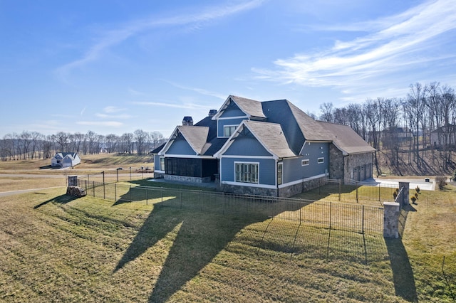 view of front of home featuring a front lawn