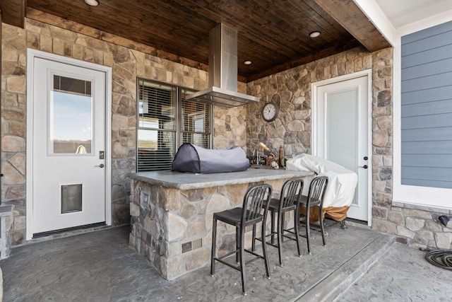 view of patio / terrace with area for grilling and exterior bar