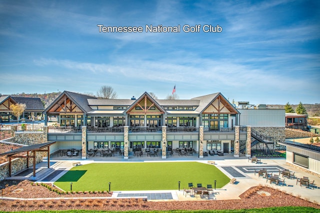 exterior space with a lawn and a patio