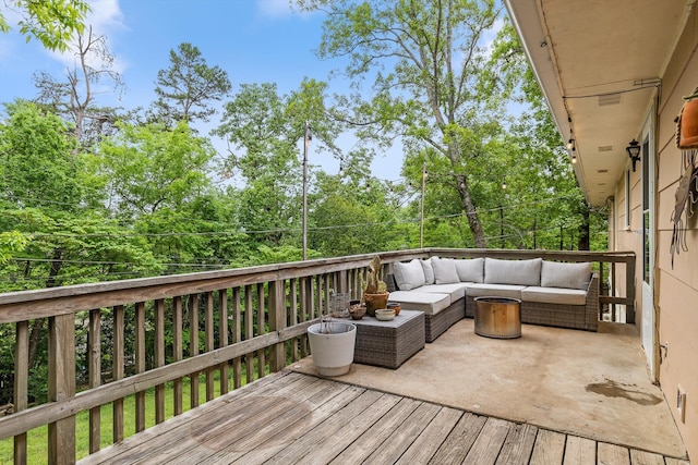 deck featuring outdoor lounge area