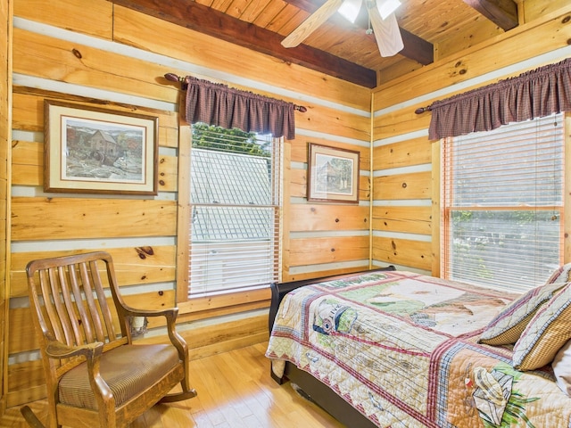 1150 Pin Hook Rd, Spring City, TN 37381 - bedroom featuring a wooden ceiling with exposed beams, wooden walls, and hardwood / wood-style flooring