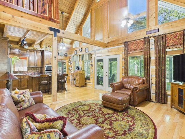 1150 Pin Hook Rd, Spring City, TN 37381 - living room with a wooden ceiling with exposed beams, high vaulted ceiling, light wood-style floors, french doors, and healthy amount of natural light