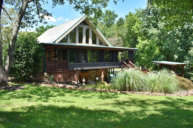 1150 Pin Hook Rd, Spring City, TN 37381 - rear view of house with a sunroom and a lawn