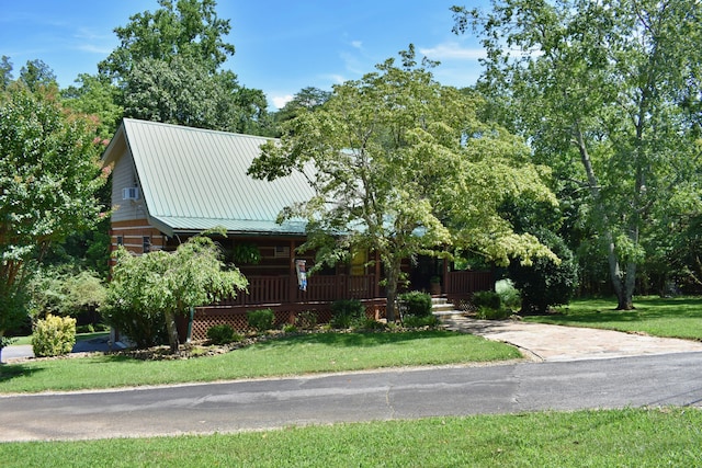 1150 Pin Hook Rd, Spring City, TN 37381 - view of front of home with a front yard, a metal roof, and a porch